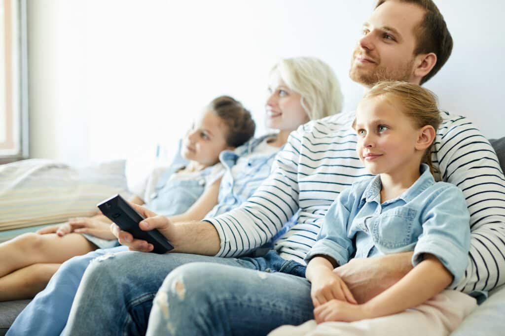 Family watching tv